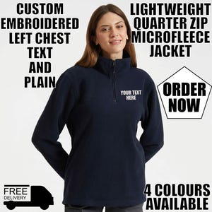 May include: A navy blue lightweight quarter-zip microfleece jacket. The jacket features custom embroidered text on the left chest, with the words "YOUR TEXT HERE". The image also includes the text "ORDER NOW" and "4 COLOURS AVAILABLE".