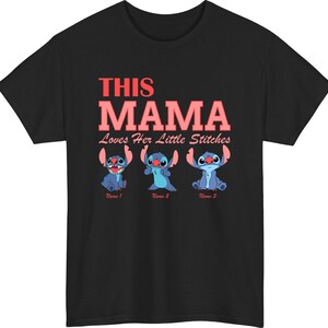May include: Black t-shirt featuring the text "THIS MAMA Loves Her Little Stitches" in red and pink. Below the text are three blue cartoon characters with the option to add names. A fun and personalized gift.