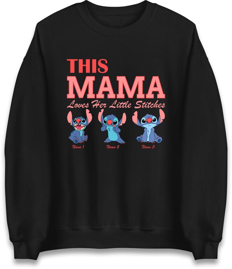 May include: Black sweatshirt with the text "THIS MAMA Loves Her Little Stitches" in red. Below the text are three blue cartoon characters. The sweatshirt is a crew neck style.
