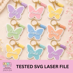 May include: Nine butterfly-shaped keychains in various pastel colours including lavender, pink, yellow, mint green, blue, peach, and light blue. Each keychain features a white script name, a gold-toned metal ring, and a matching coloured tassel.