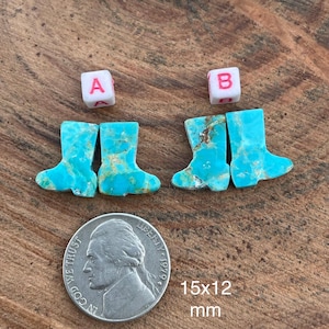 May include: Four turquoise-colored, cowboy boot-shaped gemstones with brown veining. Two small white dice with the letters "A" and "B" are above the gemstones. A nickel coin and the text "15x12 mm" are also in the image.