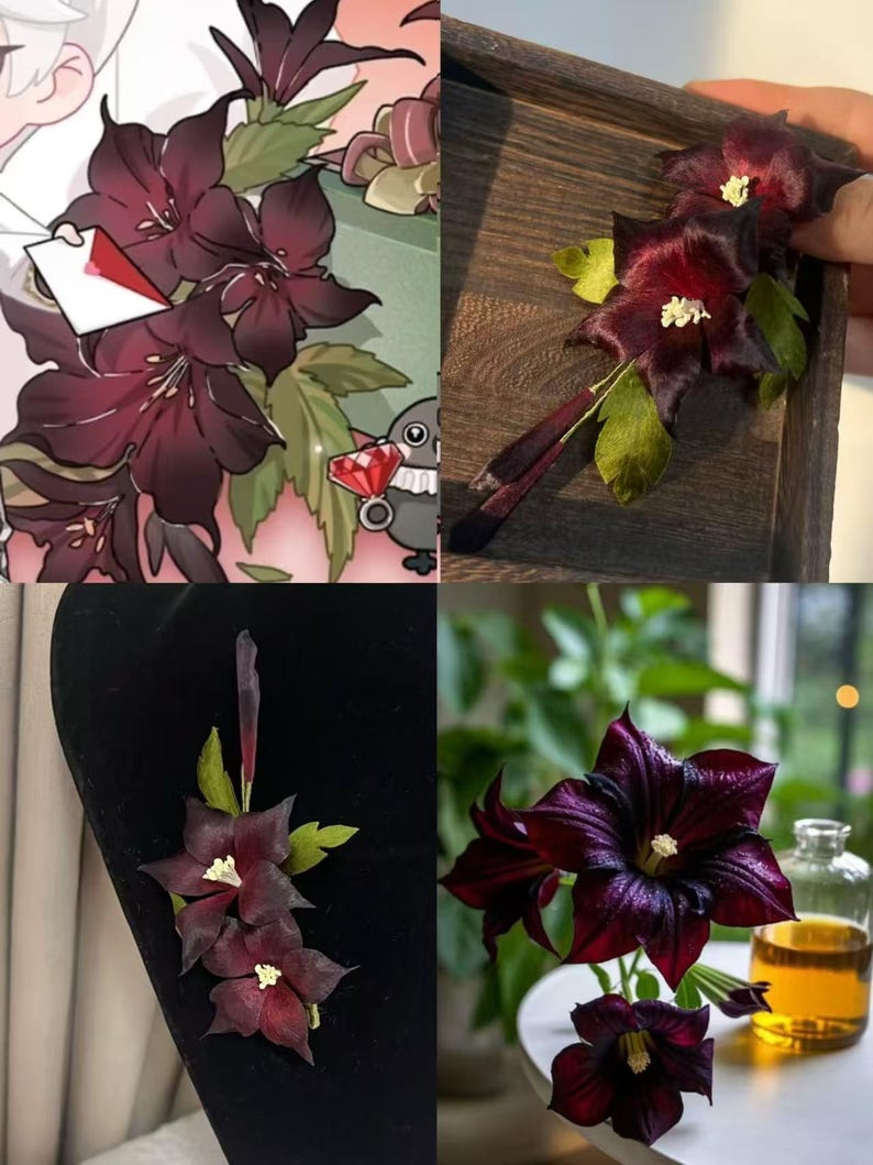 May include: A handcrafted floral hair accessory featuring deep burgundy, star-shaped blossoms with prominent pale yellow centers and green leaves. The design includes thin, dark stems and delicate petals, capturing the appearance of a dark clematis flower.