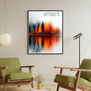 May include: An abstract landscape art print with orange and black trees reflected in water. The words "SMART" and "Life" are displayed on the print. Two green armchairs with wooden frames are in the foreground of the image.