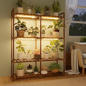 May include: A multi-tiered, wooden plant stand with built-in LED lights, showcasing a variety of potted plants. The stand is made of dark brown wood and is filled with various green plants in different sized pots. The lighting highlights the plants.