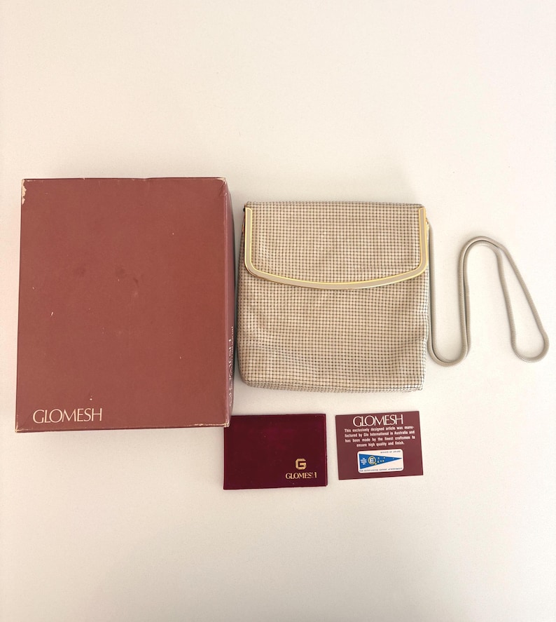 Glomesh bag with box, mirror and card