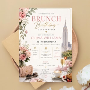 May include: A rectangular birthday brunch invitation card featuring pink roses, a view of the Empire State Building, a quilted handbag, sunglasses, a champagne flute, and a coffee cup. The text reads: YOU'RE INVITED TO A BRUNCH BIRTHDAY CELEBRATION.
