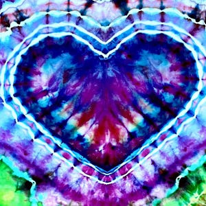 May include: A colourful tie-dye pattern with a heart shape at the centre. The heart is outlined in white and filled with shades of blue, purple, and red. The background has a mix of colours, including green and turquoise, creating a psychedelic effect.