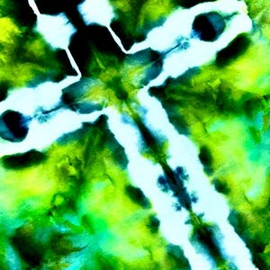 May include: A tie-dye fabric featuring a prominent white cross shape centered against a vibrant background of blended lime green, emerald green, and deep forest green hues. The design displays soft, blurred edges where the colors bleed together.