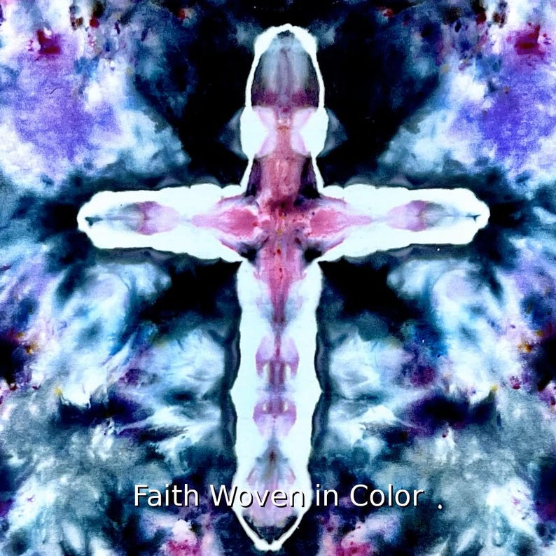 May include: A tie-dye fabric featuring a central white cross shape against a dark, swirling background of deep blue, purple, and black hues. The text "Faith Woven in Color" is printed in white at the bottom of the square-shaped textile design.