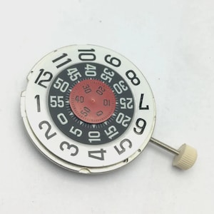 Movimiento de reloj de cuerda manual NOS de hora saltante Cal.1253-21