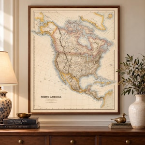 Op de afbeelding: Een ingelijste kaart van Noord-Amerika in vintage-stijl met een crèmekleurige achtergrond, gedetailleerde geografische markeringen, kustlijnen en politieke grenzen. De tekst 'NORTH AMERICA' staat in de linkerbenedenhoek van de kaart.