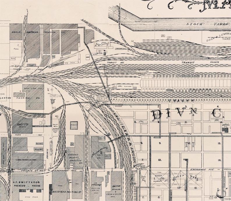 May include: A black and white map of a city with a section labeled "DIVN C" and numbered blocks. The map shows railroad tracks and buildings.