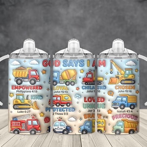May include: Three baby sippy cups with white handles and lids. Each cup features a colorful design with construction vehicles and the text "GOD SAYS I AM" along with inspirational words and Bible verses.