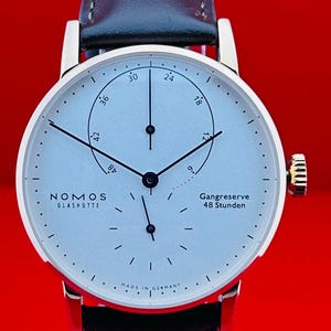 Herren Vintage Nomos Glashütte Lambda Automatik weißes Zifferblatt Arbeitsarmbanduhr