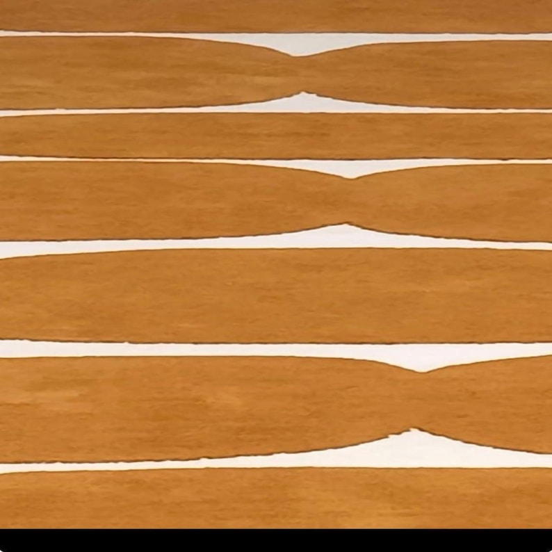 A top-down view of a rug with horizontal mustard yellow stripes, each with a slight hourglass shape, on a white background.
