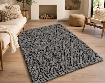 Handgjord svart geometrisk tribal matta, boho aztekisk mönstermatta, modern sydvästlig inredning