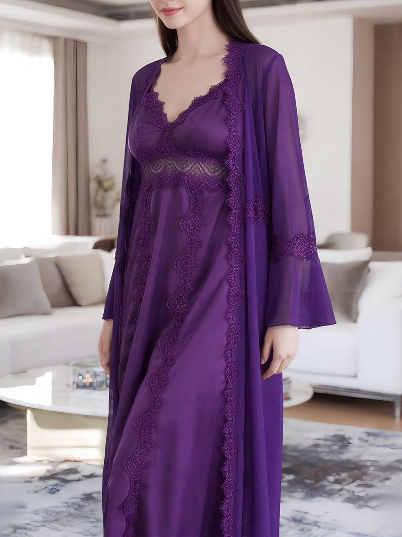 May include: A purple satin nightgown and matching sheer robe set. The nightgown features a V-neckline with lace trim and a flowing silhouette. The robe has long sleeves and lace detailing along the edges, creating an elegant and comfortable sleepwear ensemble.