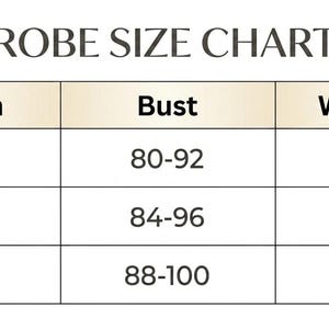 May include: A size chart for robes, with measurements in centimeters and kilograms. The chart includes sizes M, L, and XL, with corresponding bust measurements and weight ranges. The text "ROBE SIZE CHART" is at the top.