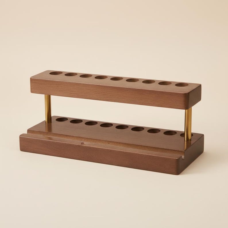 Multifunction walnut desktop organizer with 9 pen slots and phone stand, minimalist wooden office accessory with smooth polished finish, natural wood grain, and space-saving design for tidy workspaces.