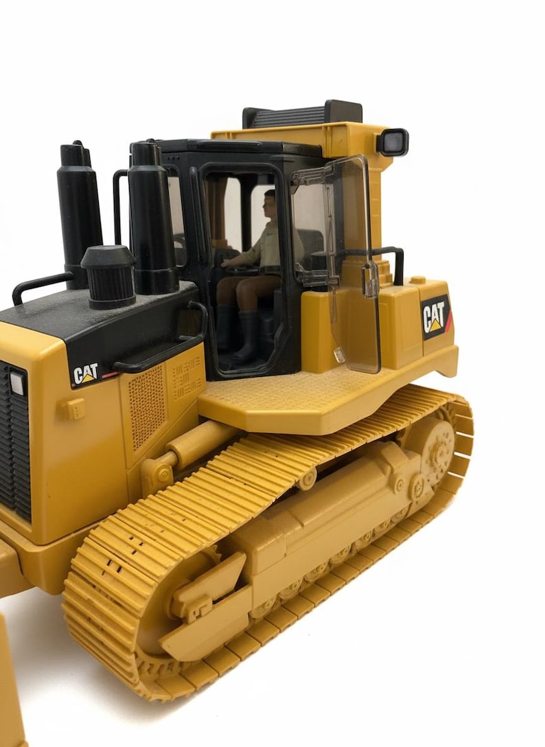 Caterpillar Diecast Masters / Leksaksbandstraktor bild 3