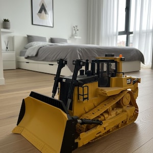 Caterpillar Diecast Masters / Leksaksbandstraktor bild 1