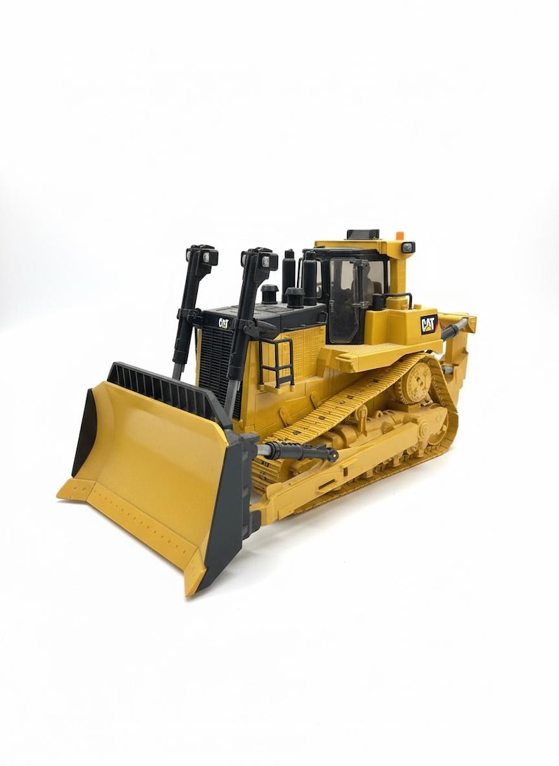 Caterpillar Diecast Masters / Leksaksbandstraktor bild 4