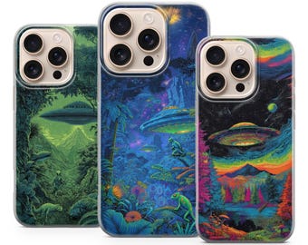May include: Three phone cases with vibrant, colorful designs. The cases feature images of UFOs, landscapes, and extraterrestrial themes. The cases have a clear border and are designed to fit a smartphone. The cases are a mix of green, blue, and rainbow colors.