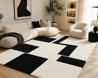 Svartvit geometrisk tuftad matta, modern abstrakt ullmatta, handgjord schackrutig matta, minimalistisk vardagsrumsinredning