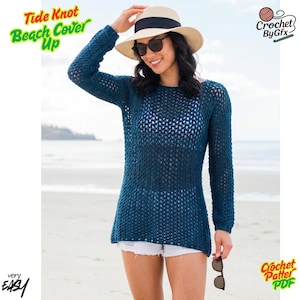 May include: A woman wearing a dark blue, open-weave crochet beach cover-up. The cover-up has long sleeves and a scoop neck. The text "Tide Knot Beach Cover Up" is visible in the upper left corner. The words "very easy" are in the lower left corner.