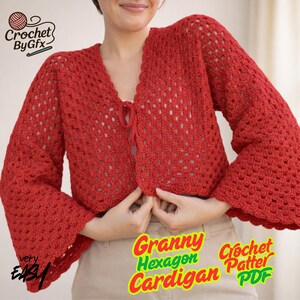 May include: A red crochet cardigan with bell sleeves and a tie closure. The open-weave design is visible throughout the garment. The text "Granny Hexagon Cardigan Crochet Pattern PDF" is displayed at the bottom of the image.