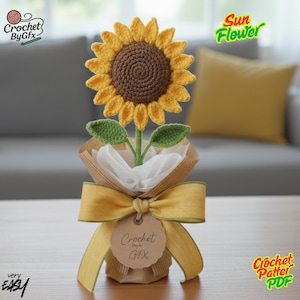 May include: A handmade crochet sunflower with yellow petals and a brown centre. The flower is presented in a burlap-wrapped pot, tied with a yellow ribbon and a tag that reads "Crochet by GFX". The image also includes the text "Sun Flower" and "very EASY".