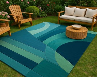 Alfombra geométrica para exteriores en color verde azulado: moderna alfombra para patio y jardín
