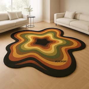May include: A unique, flower-shaped area rug with a retro design. The rug features concentric wavy layers of color, including black, brown, orange, yellow, and green. The rug is made of a soft material and is suitable for a living room or bedroom.