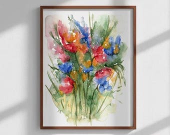 Può includere: Dipinto ad acquerello di un vivace bouquet di fiori in una cornice di legno. L'opera presenta un mix di tonalità rosse, arancioni, blu e verdi, con pennellate sciolte che creano un effetto morbido e impressionistico. I fiori sono disposti su uno sfondo bianco.