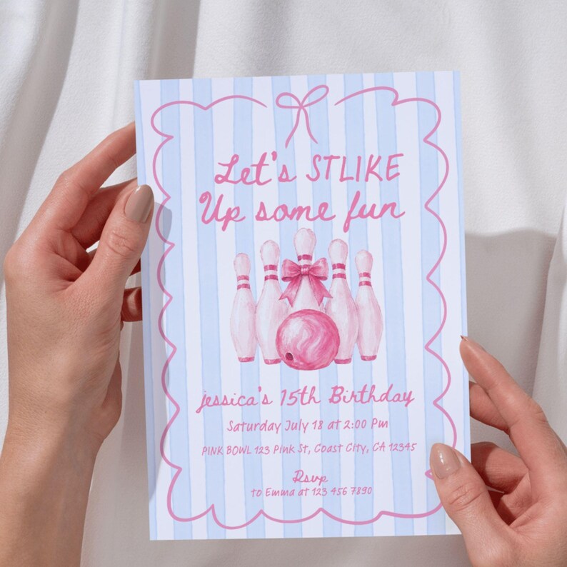 May include: A rectangular invitation card with a light blue and white vertical striped background. The text reads Let's STLIKE Up some fun, jessica's 15th Birthday, Saturday July 18 at 2:00 Pm, PINK BOWL 123 Pink St, Coast City, CA 12345, RSVP to Emma at 123 456 7890. It features pink bowling pins and a pink bowling ball with a pink bow.