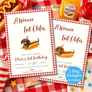 May include: Two rectangular birthday invitation cards with a red and white gingham border. The cards feature the text A Weenie Bit Older, an illustration of a dachshund inside a hot dog bun wearing a party hat and sunglasses, and event details.