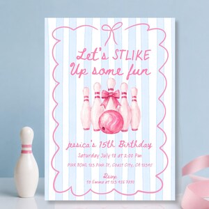May include: A rectangular invitation card with a light blue and white vertical striped background. The text reads Let's STLIKE Up some fun, jessica's 15th Birthday, Saturday July 18 at 2:00 Pm, PINK BOWL 123 Pink St, Coast City, CA 12345, RSVP to Emma at 123 456 7890. It features pink bowling pins and a pink bowling ball with a pink bow.
