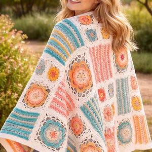 Puede incluir: Un chal de ganchillo colorido con un diseño de patchwork. El chal presenta cuadrados y motivos florales en tonos de blanco, turquesa, naranja y rosa. El tejido abierto y los colores vibrantes crean una estética bohemia, perfecta para superponer.