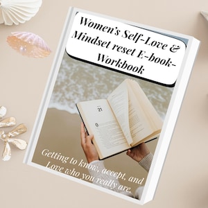 May include: An open workbook with the text "Women's Self-Love & Mindset reset E-book-Workbook" and "Getting to know, accept, and Love who you really are." The book is held open, revealing pages with the numbers 21 and 0. The background is a beach scene.