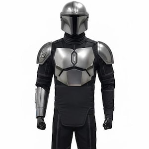 May include: A full-body costume featuring a silver helmet and chest armor. The costume includes black pants and a long-sleeved shirt with silver accents. The armor has a metallic finish, and the outfit is designed to resemble a character from a science fiction series.
