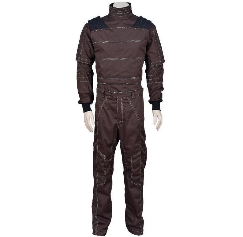 May include: A dark brown long-sleeved jumpsuit featuring a high mock neck collar, structured shoulder panels, and black ribbed cuffs. The garment is detailed with horizontal stitching across the chest and vertical seams along the legs.