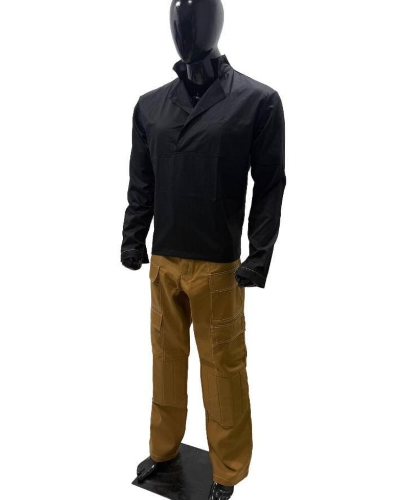 May include: A black long-sleeved shirt with a collared neckline and brown cargo trousers. The trousers have multiple pockets and visible stitching. The outfit is displayed on a mannequin.