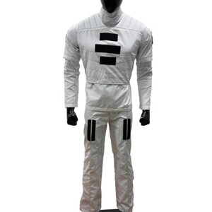 May include: A white jumpsuit with a high collar and long sleeves, displayed on a mannequin. The suit features black rectangular accents on the chest and legs. The mannequin has a black head and hands, and is standing on a black base.
