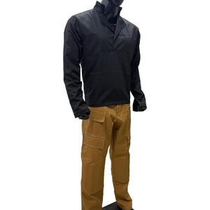 May include: A black long-sleeved shirt with a mandarin collar and brown cargo trousers. The trousers have multiple pockets and white stitching. The outfit is displayed on a mannequin.
