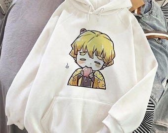 Sudadera con capucha/para jóvenes con estampado de niño rubio chibi comiendo caramelos.