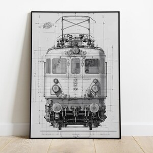 May include: Black and white blueprint-style print of a vintage electric train, framed in black. The detailed illustration shows the front of the train with its various components, including headlights, windows, and overhead equipment. The print is displayed on a white wall.