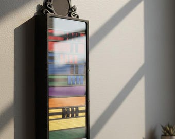 Vitrina negra para 12 o 13 cinturones de taekwondo, impresa en 3D.