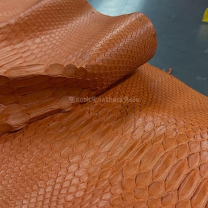 May include: A rustic wooden sign with the text "Welcome to our home" in a handwritten style. The sign features a distressed finish and a simple, inviting design, perfect for a front porch or entryway.