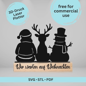 May include: A black Christmas-themed wooden decoration featuring Santa Claus, a reindeer, and a snowman. The figures are mounted on a wooden base with the German text "Wir warten auf Weihnachten". The image also includes the text "SVG • STL • PDF".