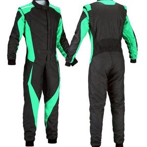 May include: Black and green racing suit with a stand-up collar and long sleeves. The suit features green accents on the shoulders, sides, and legs. The front and back views are shown.